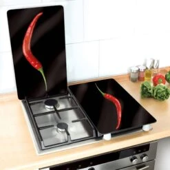 Wenko Couvre-plaques Peperoni (2 él.) 9 Wenko Couvre-plaques Peperoni (2 él.) -GourmetHome Soldes Magasin 1000274143 210618 14064500404 MOOD DETAILS P000000001000274143 mood