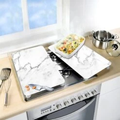 Wenko Couvre-plaques Marbrées (2 él.) 11 Wenko Couvre-plaques Marbrées (2 él.) -GourmetHome Soldes Magasin 1000274153 210618 14064800436 MOOD DETAILS P000000001000274153 mood