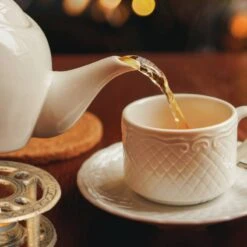 Chauffe-théière En Fonte Aspect Bronze -GourmetHome Soldes Magasin 2fafd0b09c60473ab52ea2820e380469